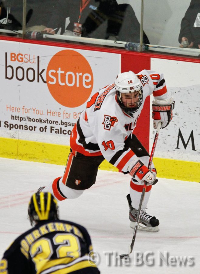 Marc Rodriguez, BG forward, sets up to shoot the puck into the net. At the Falcons’ most recent series at home against Michigan, BG made history with 5,031 people in attendance.