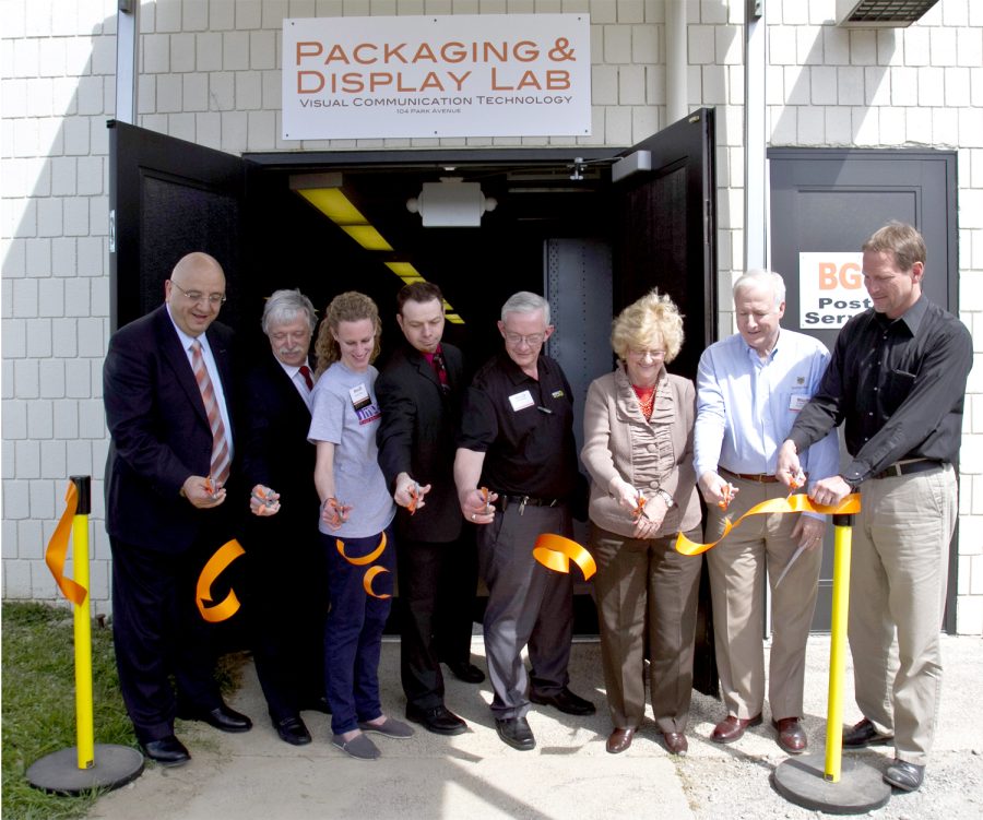 President Mazey leads a ribon cutting in front of the Packaging and Display Lab, located behind the Technology Building. The ribbon cutting symbolized the begining of the VCT open house that took place Friday from 10:00am-3:00pm.