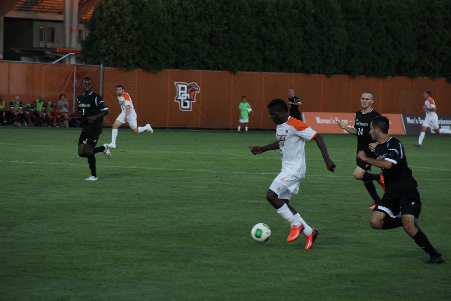 Anthony Grant dribbles the ball up field during the exhibition match against the Cincinnati Bearcats this past Saturday. BG kicks off their regular season Friday against the Malone Pioneers.