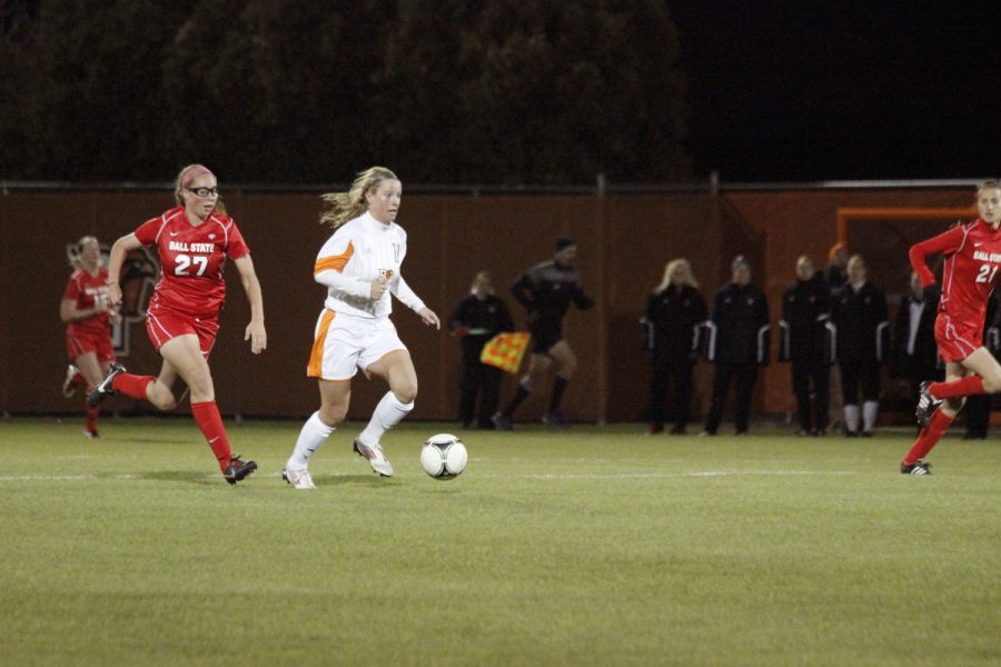 Madeline Wideman dribbles the ball past a Ball State defender in the Falcons&#8217; loss against the Cardinals over the weekend.