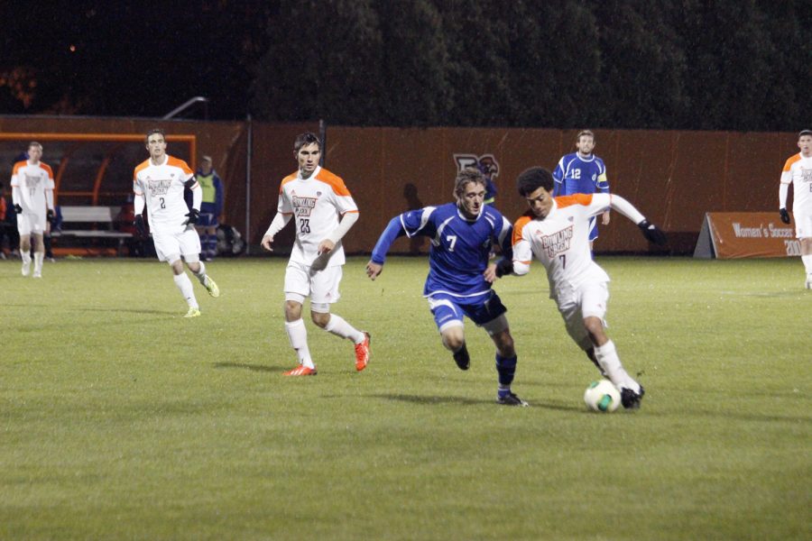 Ryan James controls the ball in the BG men's soccer game against Hartwick.