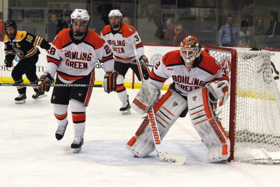 BG Hockey players defend the net against Michigan Tech this weekend at the BG Ice Arena where the Falcons had home ice advantage for the opening weekend of the WCHA playoffs.