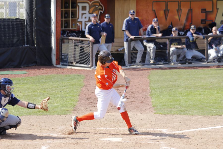 Brian Bein begins to swing during an at bat against The University of Toledo.