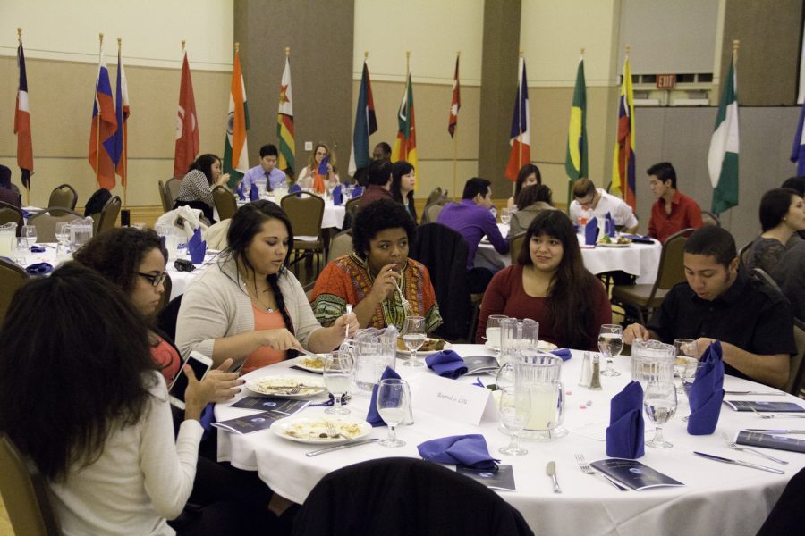Members of Latino Student Union eat a variety of international foods served at the WSA dinner.