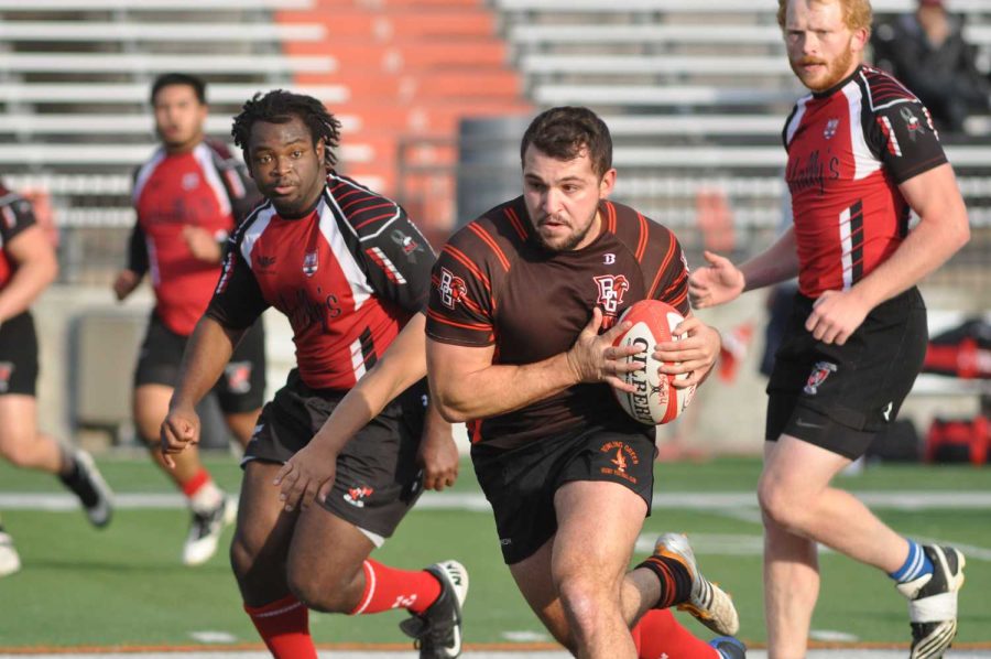 Dane+Szente+cruises+through+the+Northern+Illinois+defense+on+the+way+to+the+first+of+two+tries.