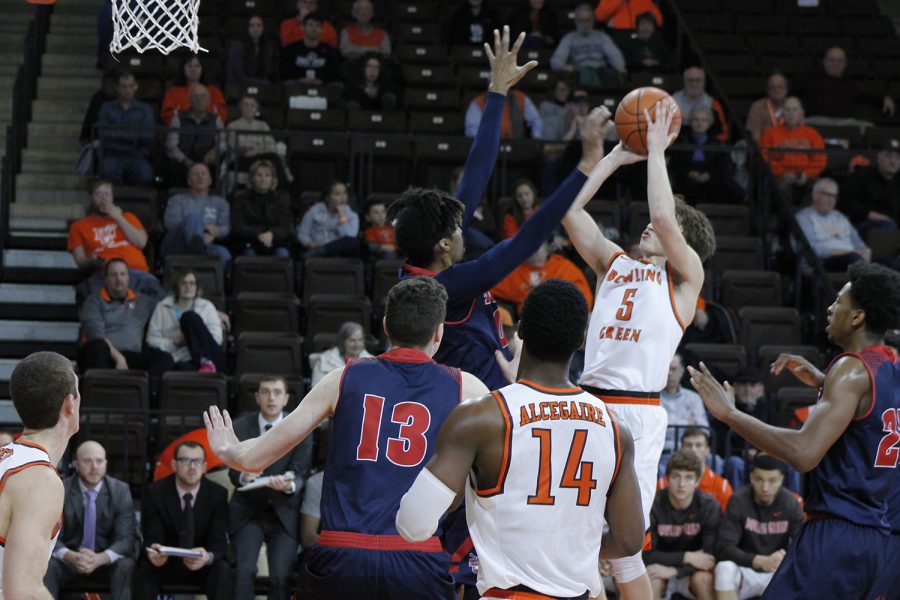 Freshman guard Dylan Frye shoots over a defender in a game earlier this season.