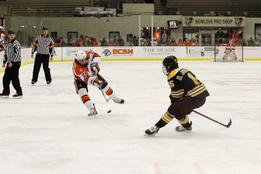 Sean Walker drives the puck down the ice against an opponent at the BG Ice Arena earlier this season.&#160;