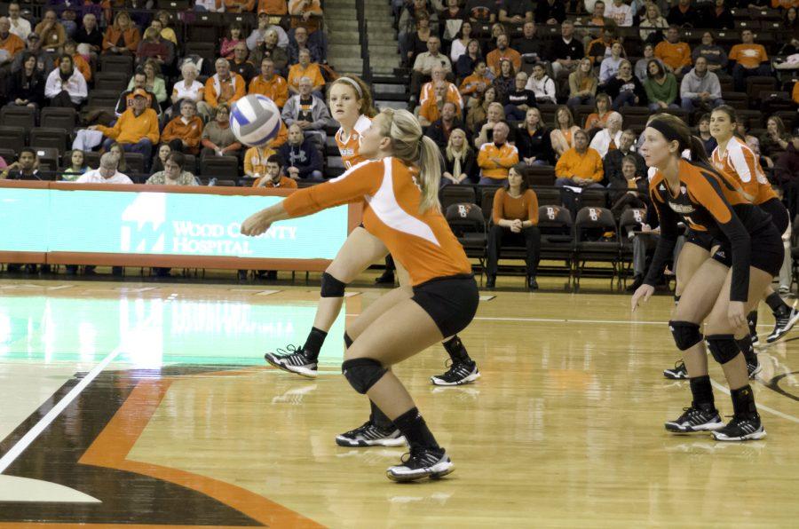 Paige Penrod, senior, digs a serve during a home match from earlier in the season.