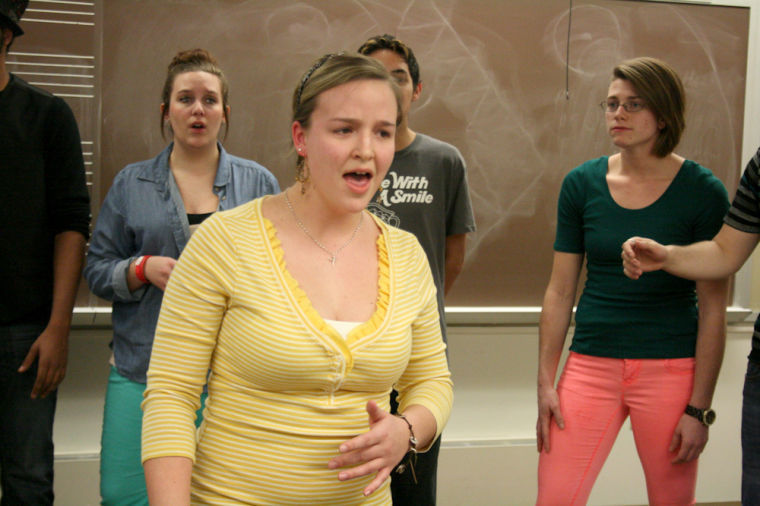 Shayle Welch practices a solo part as a soprano for co-ed a cappella group Not Yet Perfect for upcoming performance on Monday, Feb. 25 in the Arts Village. 