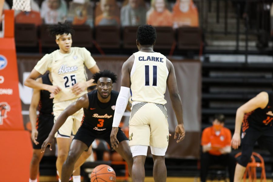 BGSU-s Caleb Fields guards Akrons Garvin Clarke in BGSUs 69-57 loss at the Stroh Center on Tuesday, Jan. 19, 2021. 