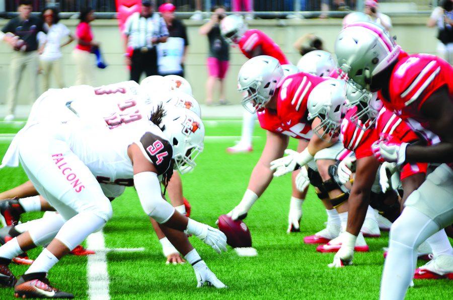 BGSU players face off with OSUs offensive line.