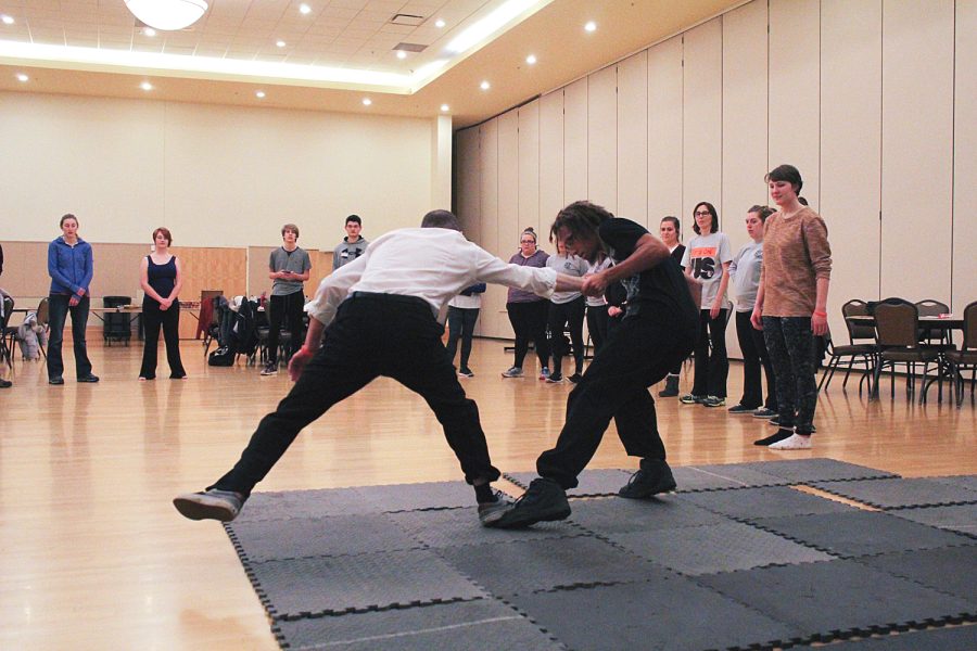 Self-defense moves demonstrated for students
