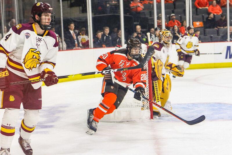 Connor Ford (20) skates in the first round of the NCAA hockey tournament against Minnesota Duluth on March 31, 2019. 