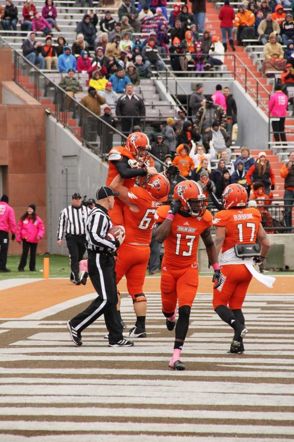 BG Football Celebrates a touchdown in their 28-25 loss to Toledo on Oct. 26. With that loss the Falcons fell to third place in the Mid-American Conference East Division.