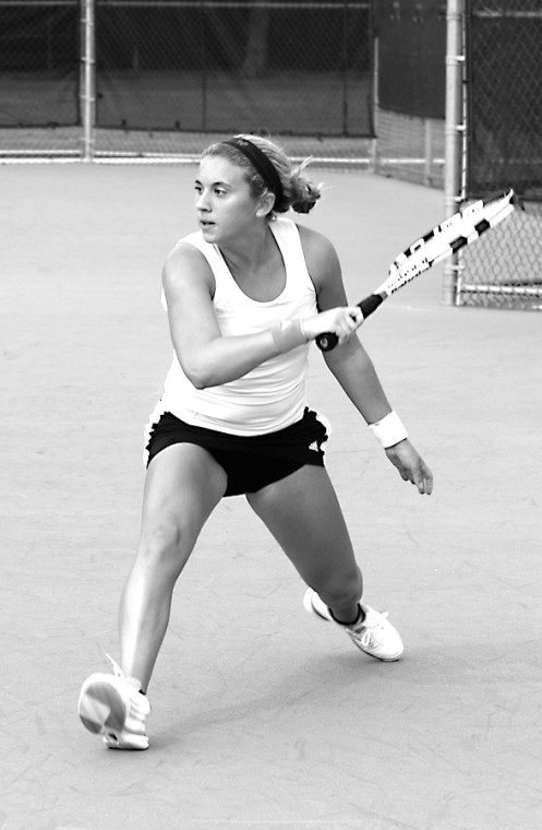 Nikki+Chiricosta%2C+BG+tennis+player%2C+takes+a+backhand+swing+to+a+ball+coming+her+way.