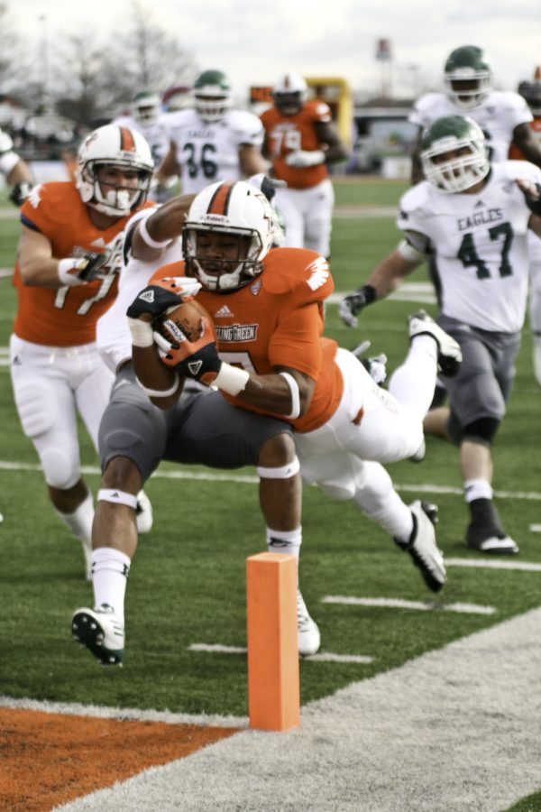 Anthon Samuel, running back, dives for a touchdown against Eastern Michigan. Samuel had two touchdowns and 181 yards against Ohio Wednesday.
