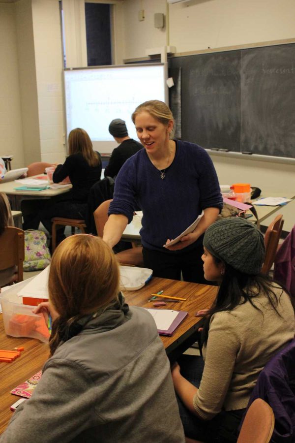 Professor+Marcy+Beaverson+instructs+students+during+her+math+class.+Beaverson+was+one+of+30+faculty+to+be+cut+from+the+University+last+fall+semester.+She+will+not+return+in+the+fall.