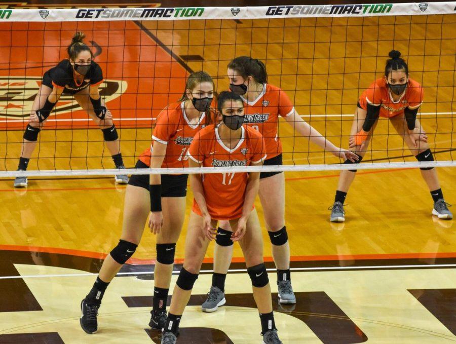 Katie Kidwell (front middle), Jacqueline Askin (middle left), Hannah Laube (middle right), Yelianiz Torres (far right) and Julia Walz (far left) prepare to receive a serve in BGSU volleyballs MAC Championship win over Western Michigan at the Stroh Center on Saturday, April 3, 2021. 