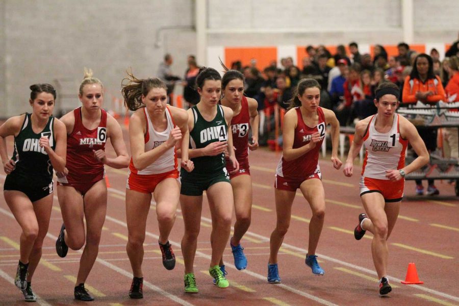 Two Bowling Green track athletes compete against runners from Miami [OH] and Ohio in a meet earlier this season.