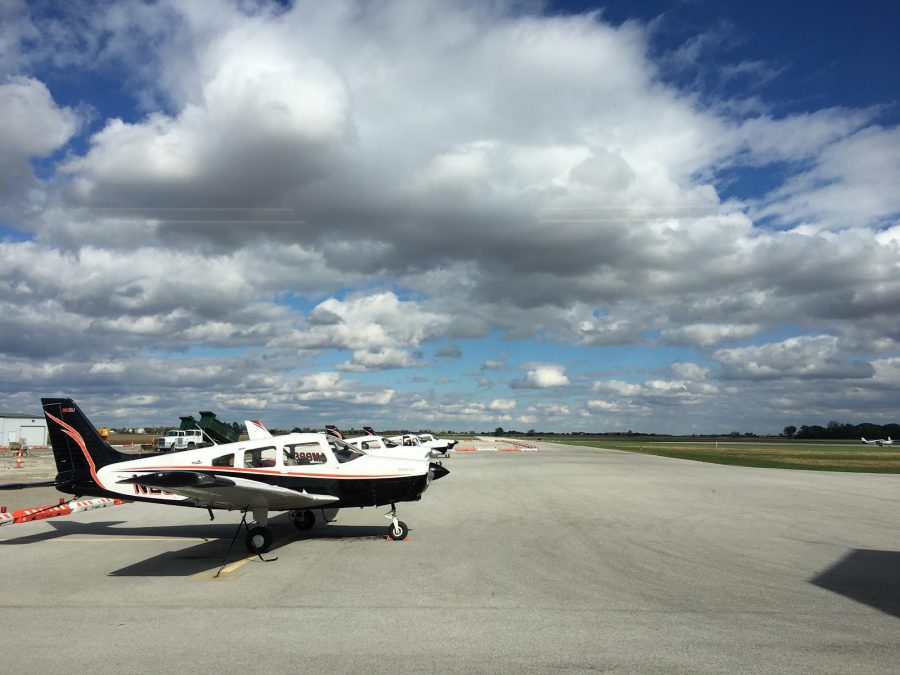 Planes used in the aviation program lined up on the runway.