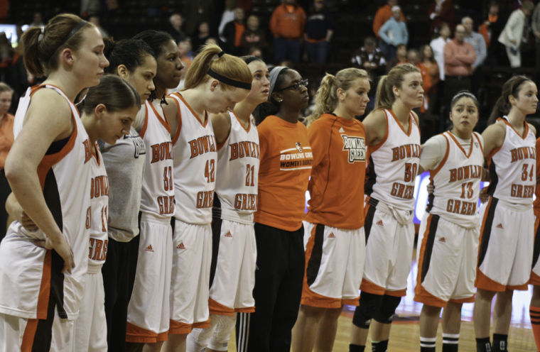 Lining up for the playing of the alma mater is the Falcons women’s basketball team after its loss to Drexel on Thursday night in the third round of the 2013 WNIT.