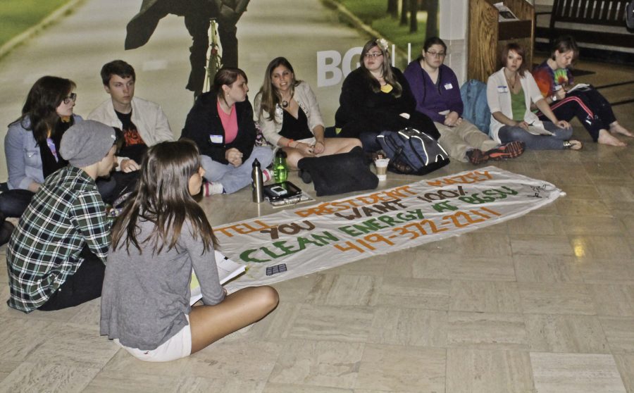 Members+of+the+Environmental+Action+Group+protest+in+McFall+Center%2C+lobbying+for+100+percent+clean+energy+at+the+University.