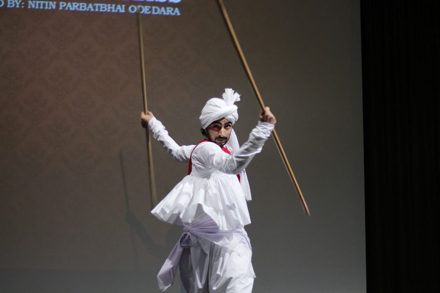 Nitin+Parbatbhai+performs+an+Indian+stick+dance
