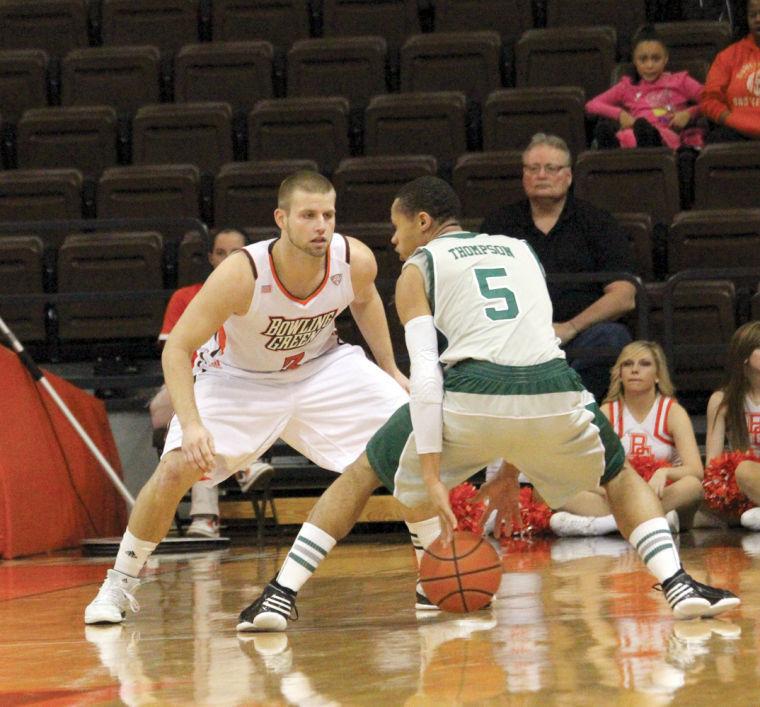 Luke Kraus guards an Eastern Michigan forward. Kraus had two points in the Falcons loss at Buffalo.