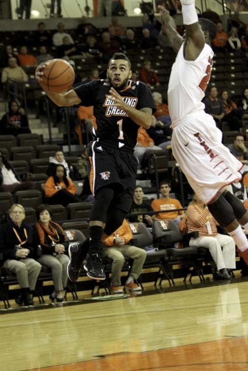 Jordon Crawford, BG point guard, drives to the rim against a Detroit defender Tuesday night at the Stroh Center. Crawford led BG with 26 points.
