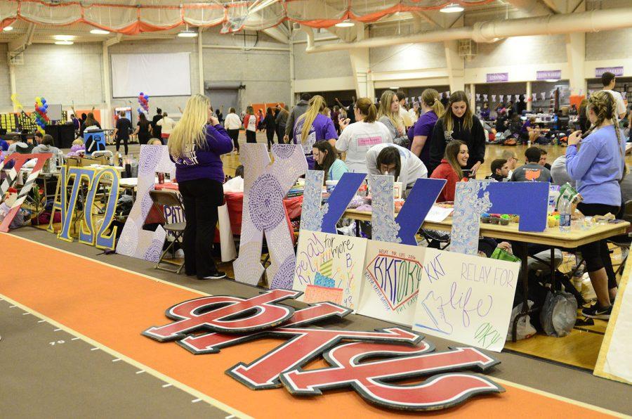 Fraternities and sororities displays their letters at different tables set up during Relay For Life.