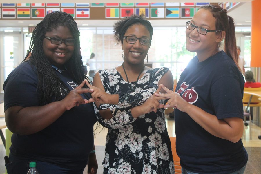Delta Xi Phi sisters show their spirit for their multicultural organization.