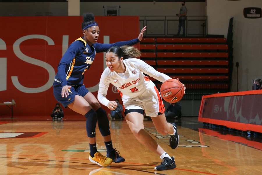 BGSUs Olivia Trice drives against Toledos Quinesha Lockett in the Falcons 76-59 victory over the Rockets at the Stroh Center on Saturday, Jan. 30, 2021. 