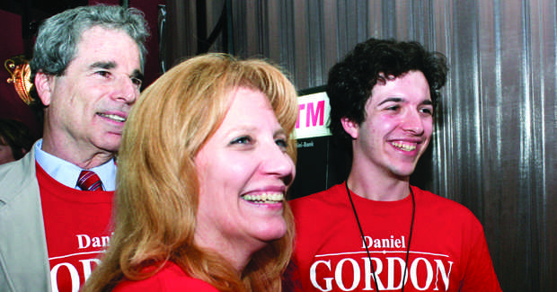 Daniel Gordon celebrates with his parents at the Cla-Zel
atuesday night when he heard the news that he won the election for
City Council