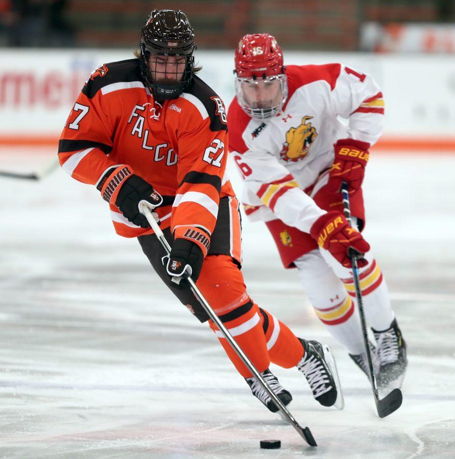 BGSU's Tim Theochardis handles the puck in their game against Ferris State at Slater Family Ice Arena on Friday, Dec. 6, 2020.