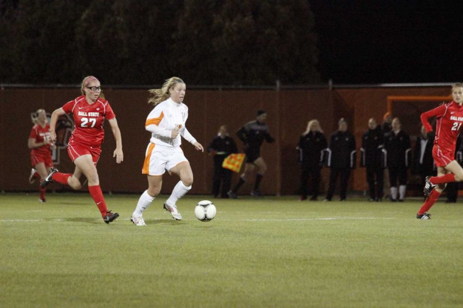 Madeline Wideman dribbles the ball past a Ball State defender in the Falcons&#8217; loss against the Cardinals over the weekend.