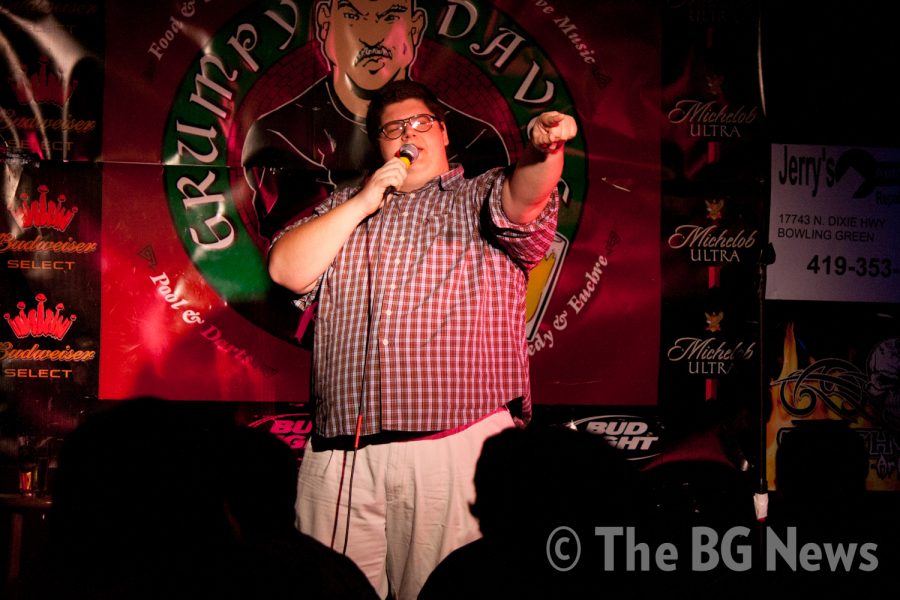 Dustin Meadows, University alumnus, performed on stage at Comedy Night at Grumpy Dave’s Pub on Tuesday evening. Meadows entertained the crowd with his funny jokes, based on dark humor.