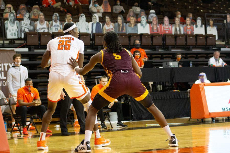  BGSUs Daeqwon Plowden backs down Meikkel Murray in the Falcons 90-69 win over Central Michigan on Tuesday, Jan. 5, 2021 at the Stroh Center 