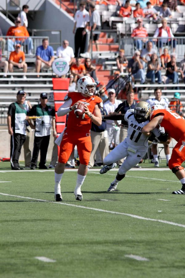 Matt Johnson remains calm in the pocket as an Akron defender rushes him during BG’s 31-14 win over the Zips this past weekend.