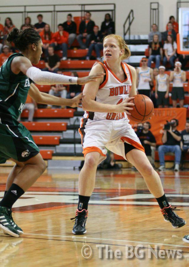 Danielle Havel, BG forward, looks to make a pass over an Eastern
Michigan defender after rebounding the ball.