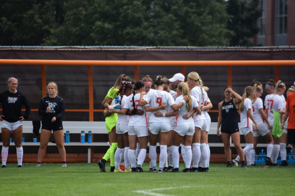 BGSU Soccer players huddled up before game.