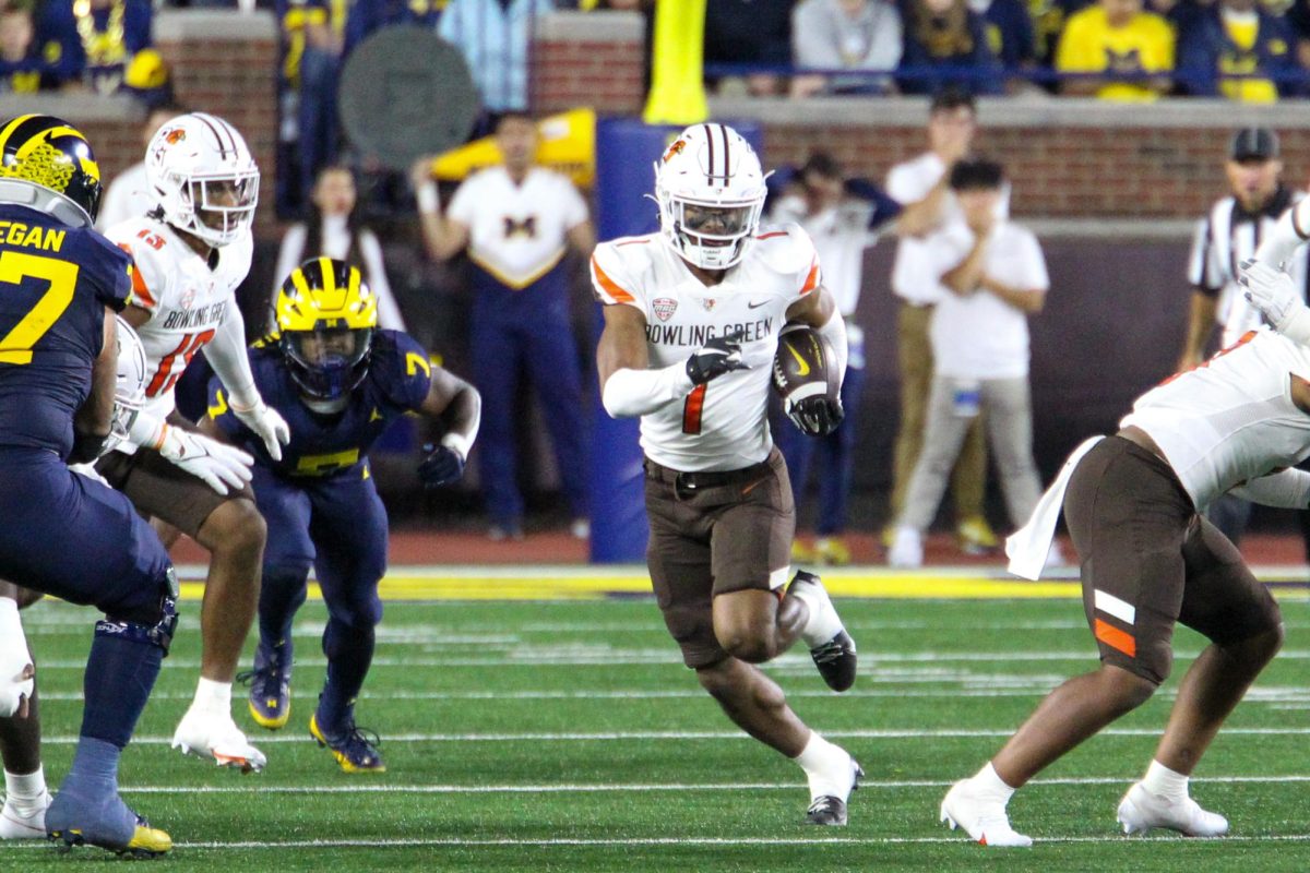 Oladokun running after intercepting the ball