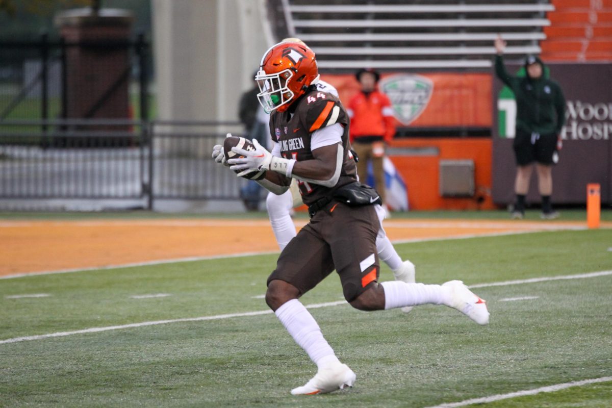 Harold Fannin Jr. making a catch that would lead to a touchdown