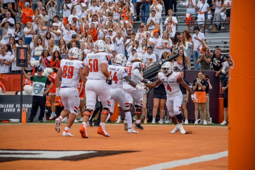 The team celebrating after a Terion Stewart touchdown against Eastern Illinois