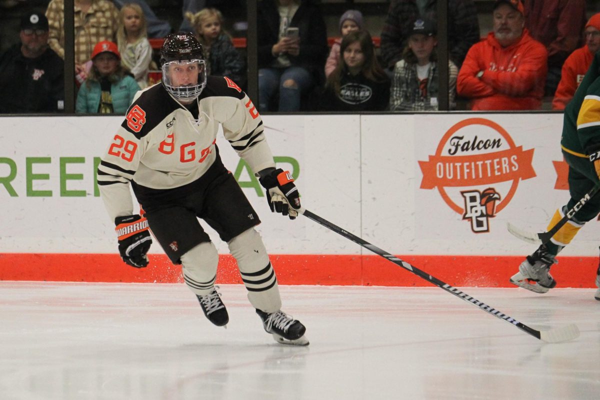 Brody Waters looking towards the puck