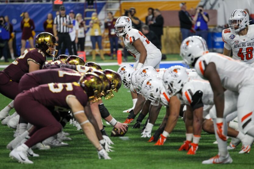 Cole Kramer and the Minnesota offense lining up for a snap against BGSUs defense