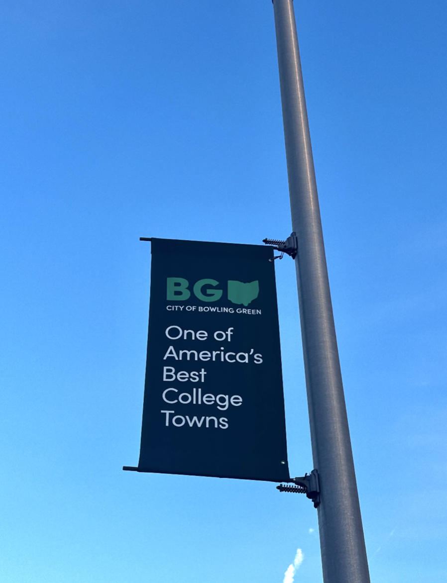A+pole+banner+in+downtown+Bowling+Green+reads+%E2%80%9CCity+of+Bowling+Green%3A+one+of+America%E2%80%99s+best+college+towns%E2%80%9D+on+a+sunny+day.+
