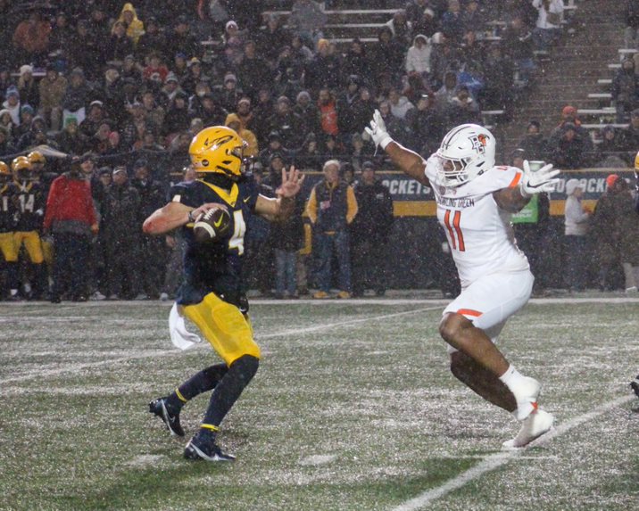 Karl Brooks going for a sack against Toledo's Tucker Gleason