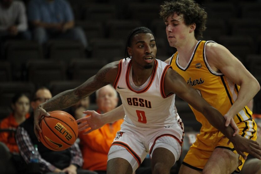 Marcus Hill dribbles the ball against Ohio Dominican