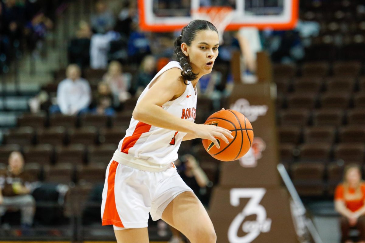 Amy Velasco (1) dribbling with ball