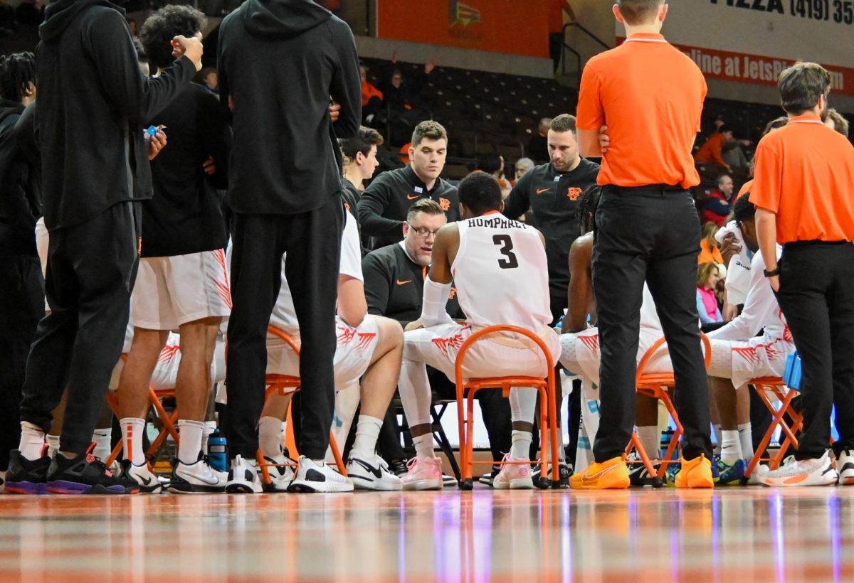 Head Coach Todd Simon talking to BGSU during a time out.